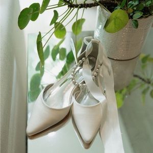 White satin wedding shoes